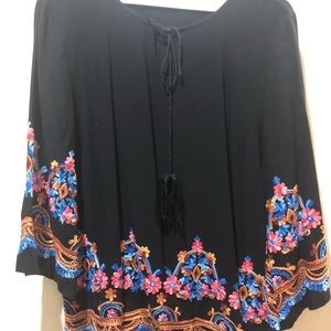 Black shirt with bright flowers